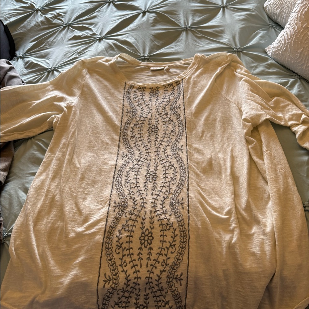 Elegant Cream Top with Intricate Design